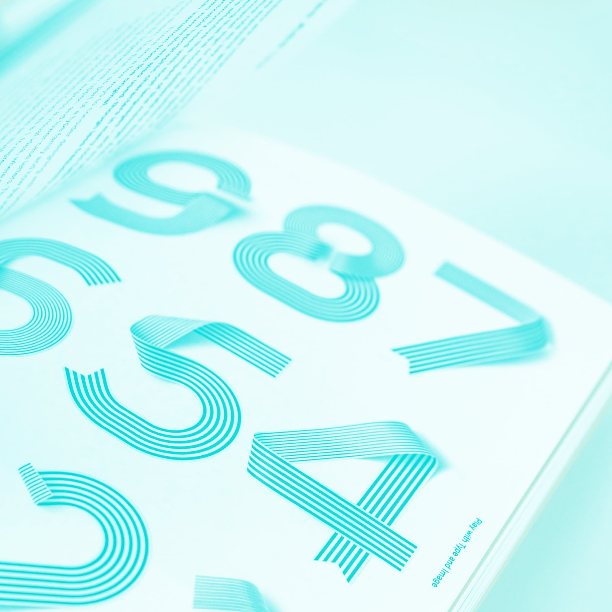 open design book decorative numbered typography teal linework