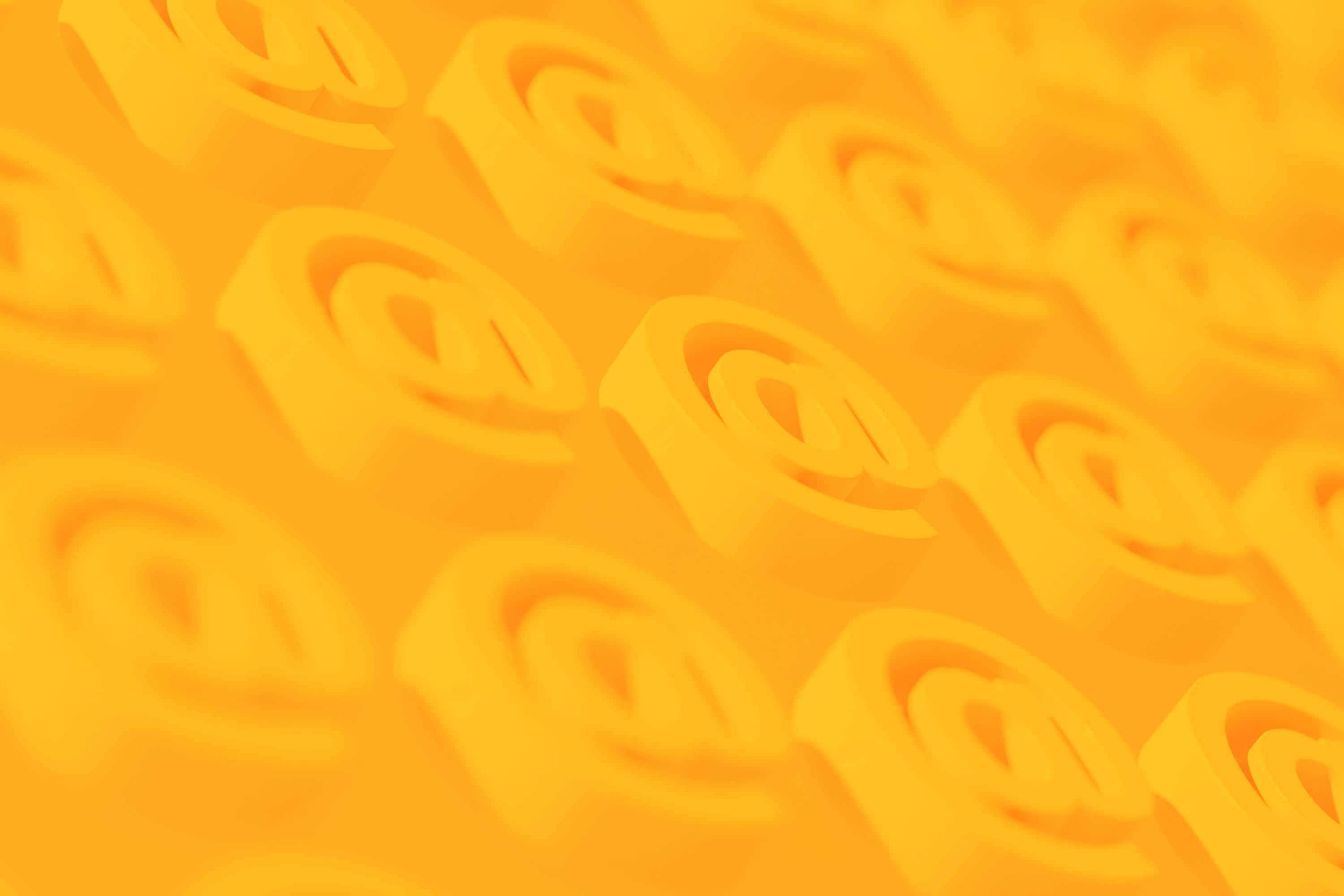 repeating at symbol pattern 3d embossed orange background