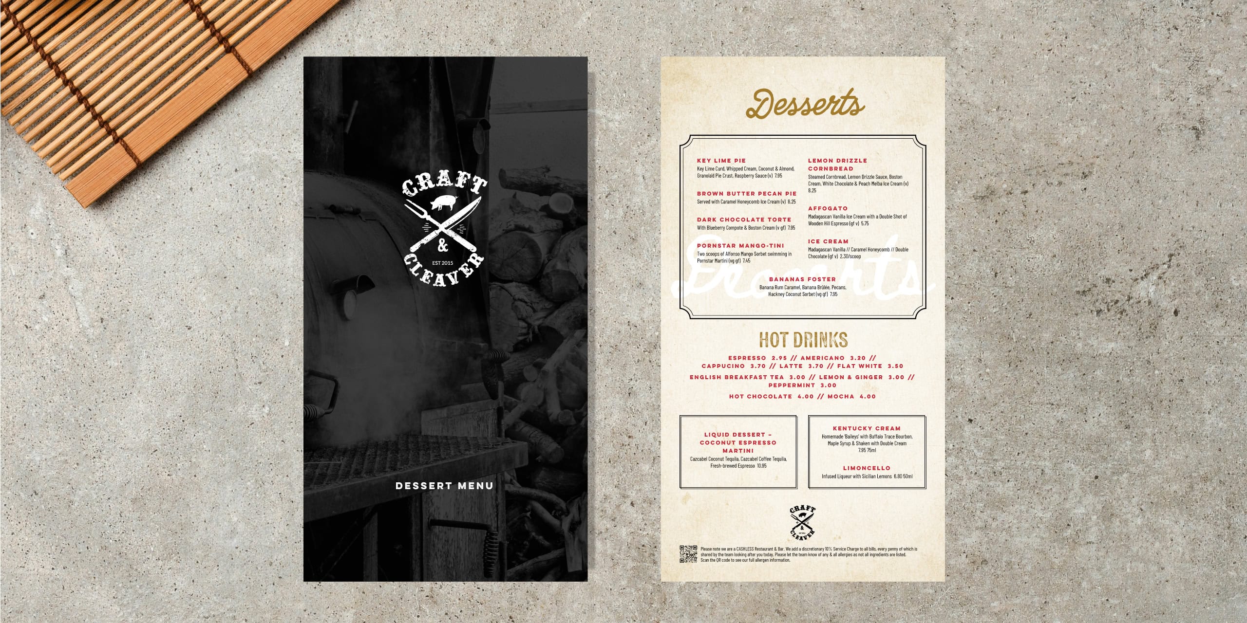 Craft & Cleaver dessert menu cover and drinks menu photographed on a concrete surface